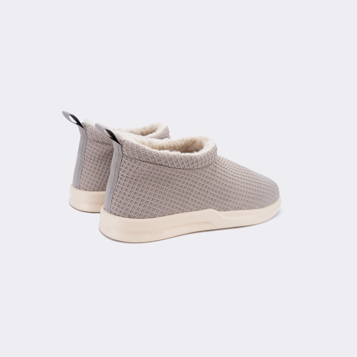 light grey shearling lined waffle knit slip on shoe with white sole 