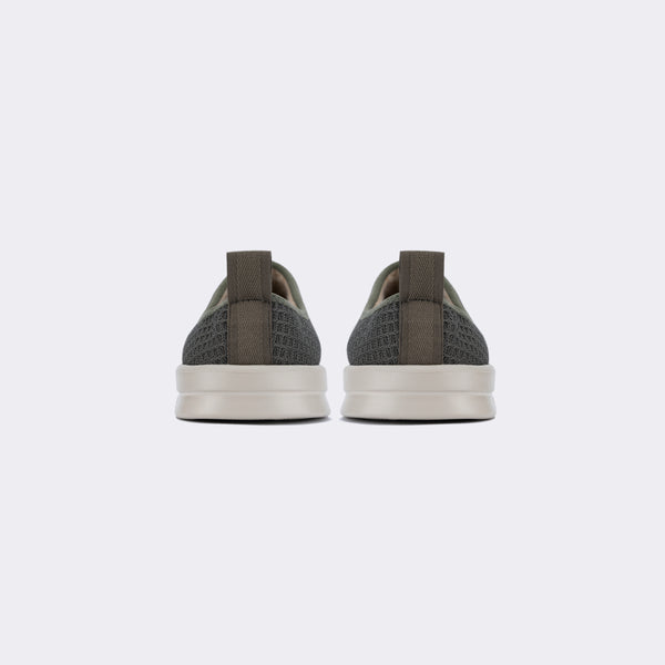 dark shearling lined grey slip on waffle shoe with white sole